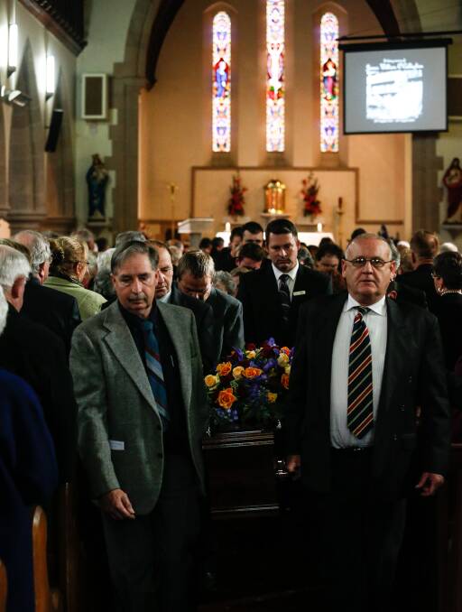 Time to go: The coffin of Bill O'Callaghan is carried out of St Patrick's church in Wangaratta following a funeral mass on Thursday. Picture: Mark Jesser
