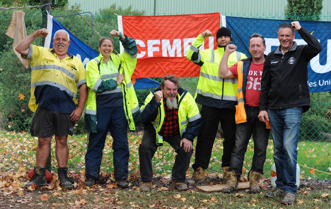 LONG-HAUL BATTLE: Carter Holt Harvey workers Leigh Mitchell, Corinne Evans, Mark Simpson, Aaron Young, Jed Molik and CFMEU district assistant secretary Andrew Vendramini.