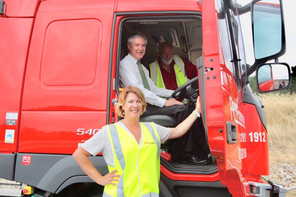 NEW TECHNOLOGY: NSW Roads, Maritime and Freight Minister Melinda Pavey, Albury MP Greg Aplin and truck industry representative Paul Pulver inspect the Ron Finemore B-double.