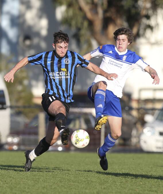All in: Mytleford's Aaron Redman gets to the ball first in his side's Albury-Wodonga Football Association cup finals battle with Albury City at La Trobe University Oval. Picture: ELLENOR TEDENBORG