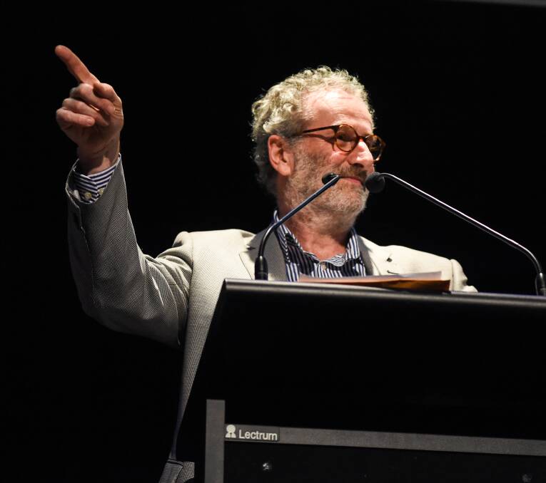 MAN IN CHARGE: Moderator and ABC radio presenter Jon Faine showed plenty of his wit on Monday night.
