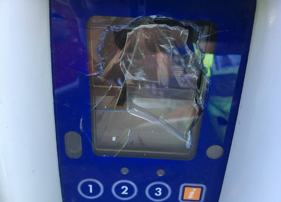 SMASHED UP: Damage caused to one of the Ovens Street parking meters.