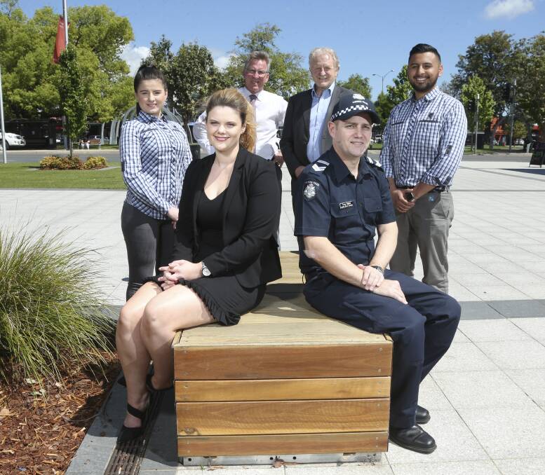 MAKING A STAND: Telstra's Michelle Lascelles, Slater and Gordon's Sam Johnston, Mayor Kevin Mack, Don Cameron, Troy Bakic and Richard Pineros will be involved in the White Ribbon ball. Picture: ELENOR TEDENBORG