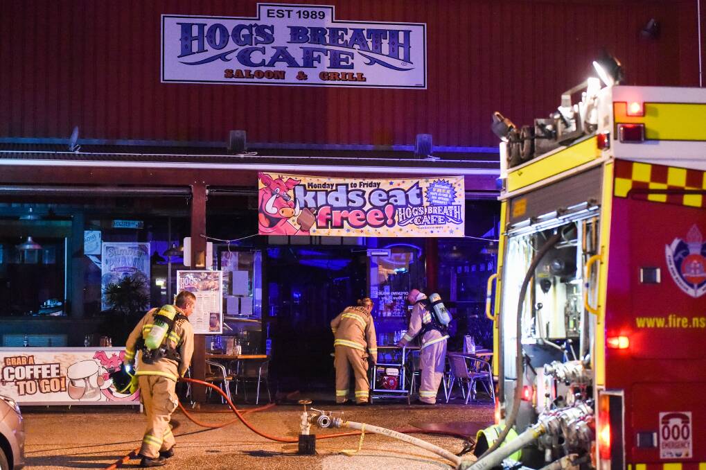 ALL HANDS ON DECK: Five fire crews attended Saturday's fire at Hog's Breath Cafe, tackling the blaze in the air conditioning duct. Pictures: MARK JESSER