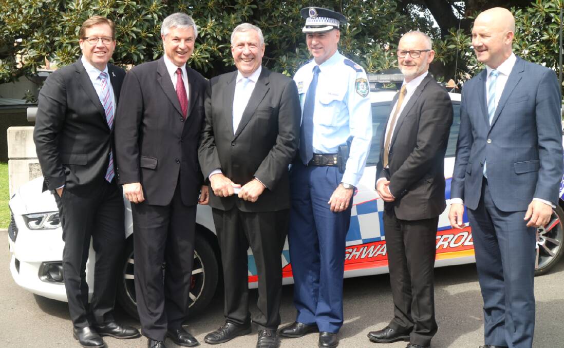 POLICE FUNDING: Police Minister Troy Grant, Albury MP Greg Aplin for Albury and Roads Minister Duncan Gay, the heads of the highway patrol, Centre for Road Safety and NRMA.