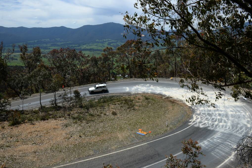 SLOW POINT: The hairpin bend on Tawonga Gap Road were up to 40 litres of diesel was poured on Saturday, before quickly cleaned up by firefighters. Picture: MARK JESSER