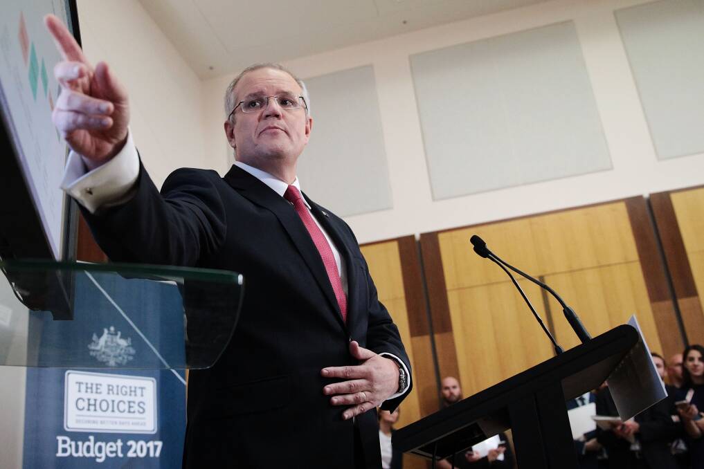 BUDGET WINS: Treasurer Scott Morrison at Parliament House on Tuesday said he wanted regional communities "to take control of their own economic future" with funding announcements. Picture: GETTY IMAGES