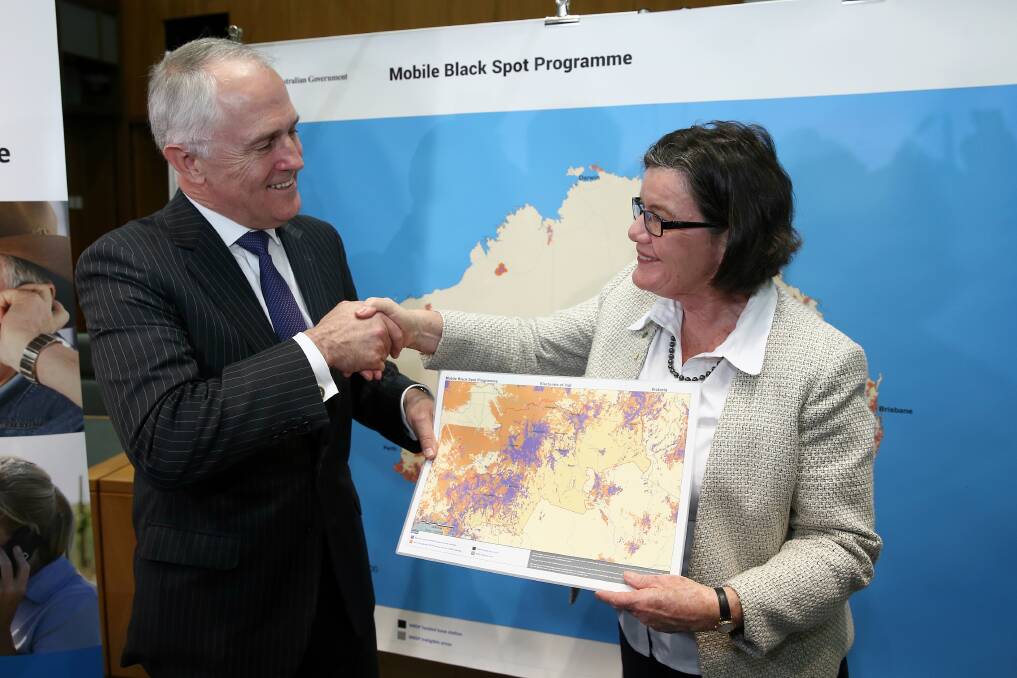 HANDSHAKE AGREEMENT: Prime Minister Malcolm Turnbull and independent MP Cathy McGowan worked together in Parliament in 2015 and have come to an agreement for the next three years.