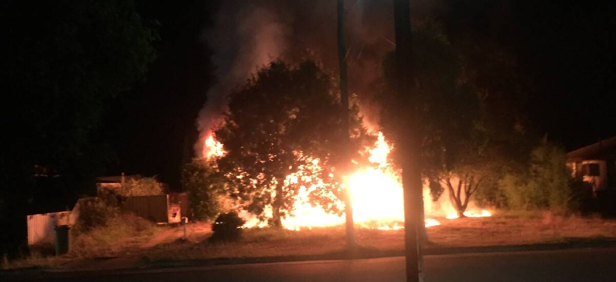 UP SHE WENT: Jim Rose and his wife captured this image of the Boomerang Drive house up in flames, but said he was not worried it would spread.