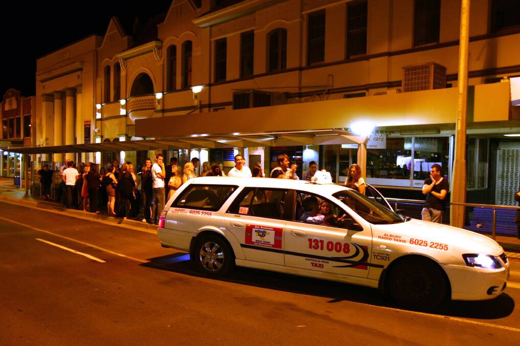 TRANSPORT NEED: The line for taxis during a night in Dean Street, Albury.