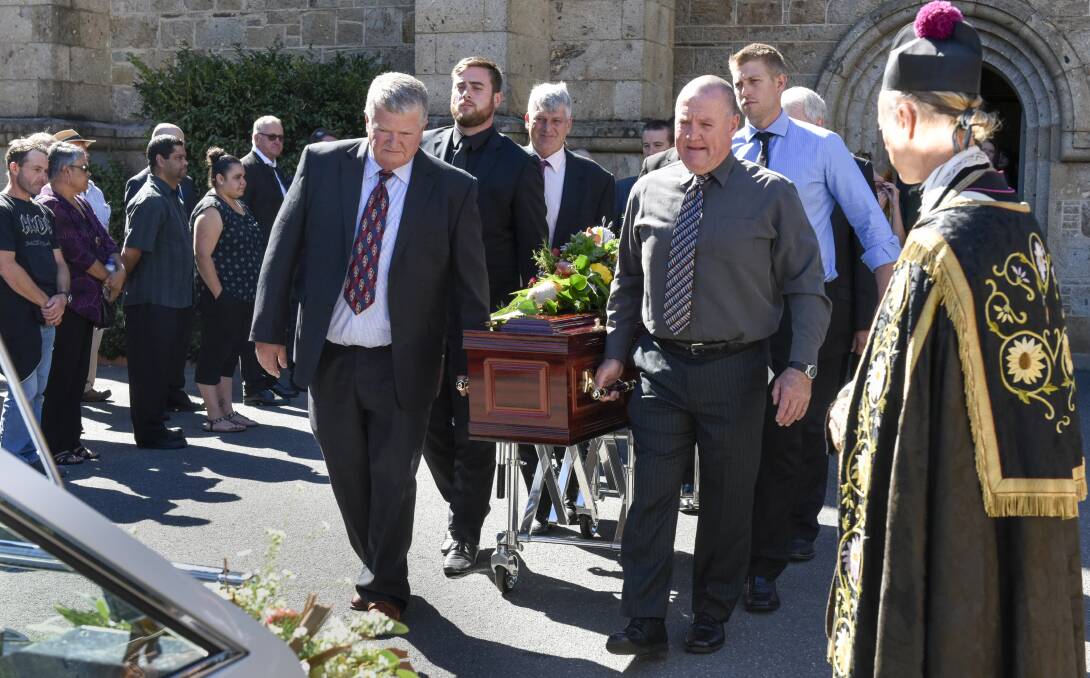 FAMILY LEGACY: The casket of Daryl Gray was carried from St Matthew's Anglican Church before a procession along Kiewa Street. Pictures: SIMON BAYLISS