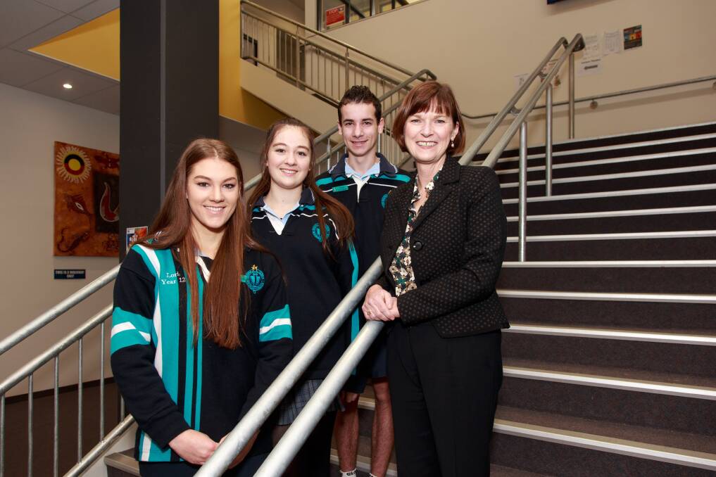 HEALTH CARE: Wodonga Senior Secondary College students Lori Gow, MJ Dohrmann and Jye McBurnie with cabinet secretary Mary-Anne Thomas celebrate the Doctors in Secondary Schools Program. Picture: SIMON BAYLISS