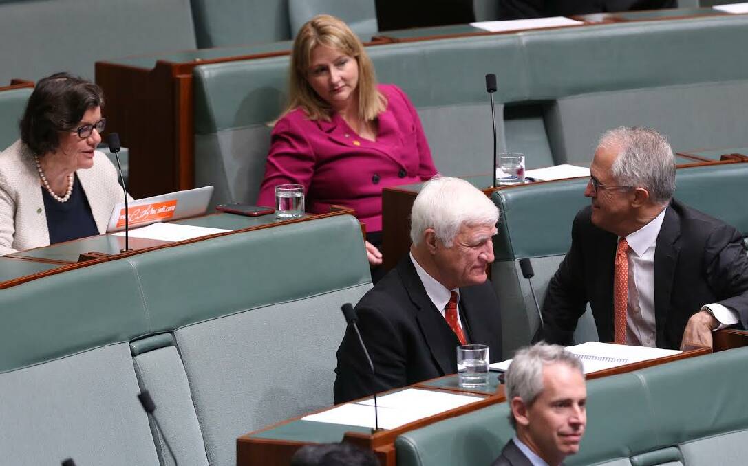 ORANGE BUDDIES: Cathy McGowan, Rebekha Sharkie and Bob Katter with Malcolm Turnbull in parliament on Wednesday. Picture: ANDREW MEARES