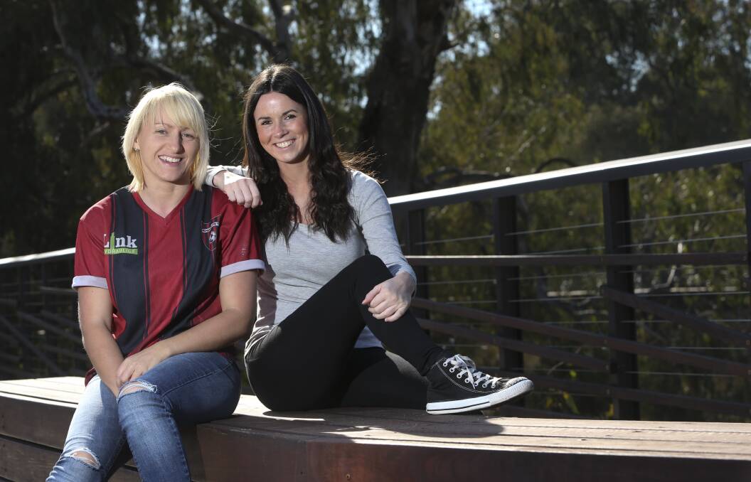 Pommy invasion: Michelle Glen and Kirsty Lewis have found a temporary home in Wangaratta with their partners, who moved to the city to play soccer for the Devils. Picture: ELENOR TEDENBORG