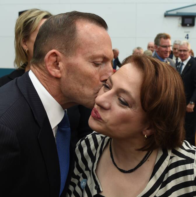 FINAL VISIT: Outgoing Prime Minister Tony Abbott plants a kiss on Indi Liberal candidate Sophie Mirabella's cheek during a whistlestop trip to Albury-Wodonga on September  4. Picture: MARK JESSER
