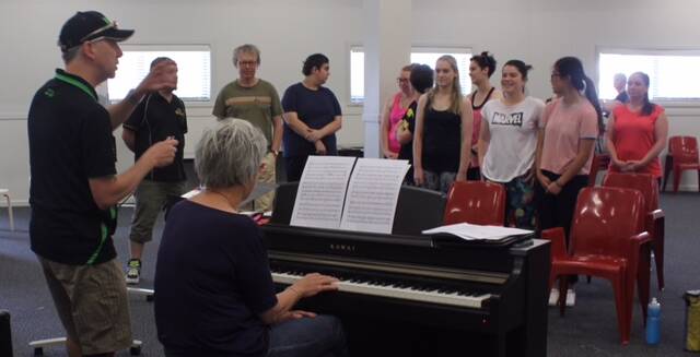 Wicked's Musical Director Brett Spokes puts hopefuls through their paces.