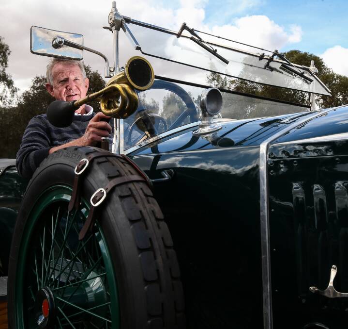 SUNDAY CRUISE: Justin Coxhead from Bright, whose father was a founding member of the Vintage Sports Car Club of Victoria, with his 1921 Vauxhall E Type 30-98, one of only five of its kind in Australia. Pictures: JAMES WILTSHIRE