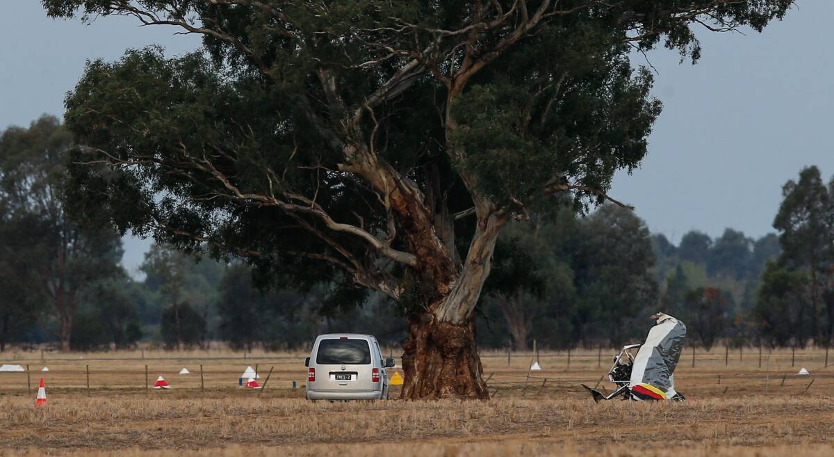 FATAL CRASH: The wreckage of Sunday's ultralight plane crash sits in a paddock near the Yarrawonga Airport. Two men died in the crash. Picture: MARK JESSER