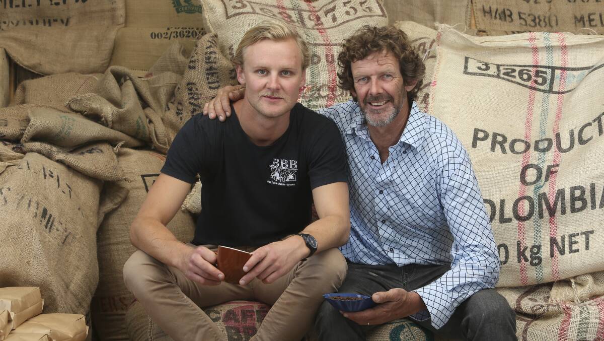 BEAN SCENE: Albury coffee roaster Harry Valentine Perry and his father Ross at Harry's roasting and retail outlet. The pair are bound for Colombia to learn about coffee production at farms in the renowned Colombian coffee triangle. Picture: ELENOR TEDENBORG