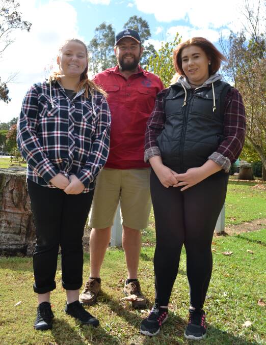 COW GIRLS: Year 10 students Natalya Farmer, left, and Chloe Lade will spend a week living and working on a 500-head dairy farm, operated by Evan Nicholas at Biggara.