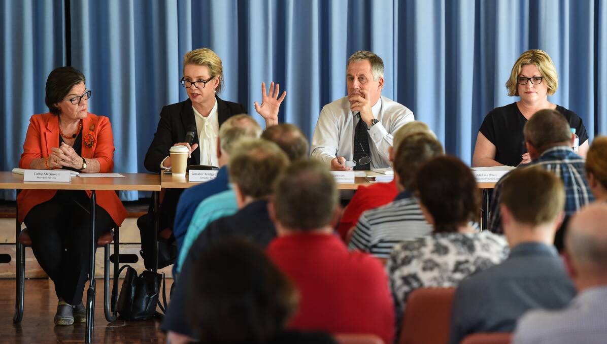 Independent Member for Indi Cathy McGowan, who lobbied to bring the government to Tangambalanga to hear dairyfarmers woes, with Senator Bridget McKenzie, Department of Agriculture and Water Resources' Greg Williamson and Department of Human Services' Melissa Ryan. Picture: MARK JESSER