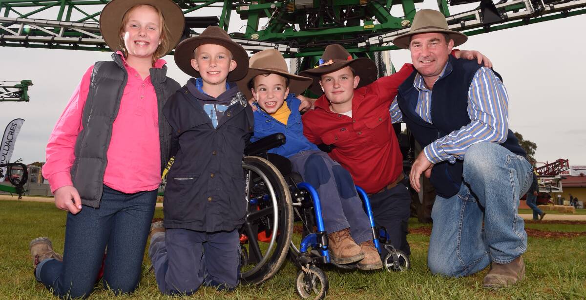BOOM TIMES: The Sandral family from Oaklands - Jennifer 11, Nicholas 9, Matthew 6, Charlie 12 and Anthony - at the Henty Field Days. Picture: MARK JESSER