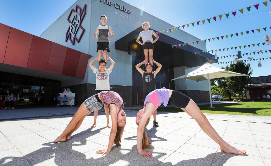 FLY IN FUN: Members of the Flying Fruit Fly Circus students Lilly Holmes, 11, and Poppy McFarlane, 12, with Oliver Foley, 14, Fran Skok, 13, Taj Murphy, 13, and Elli Cooper-Stonehouse, 12, at The Cube Wodonga. Picture: MARK JESSER