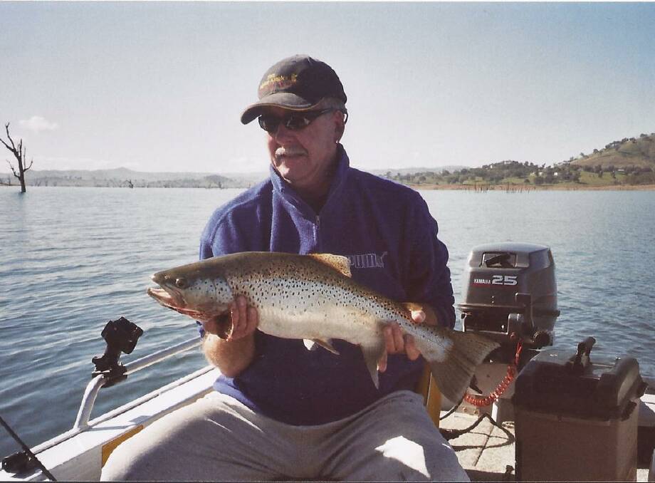 Andy Hamilton-Smith caught this impressive 8lb trout in Lake Hume on a small trout pattern stump jumper. The catch puts him in contention for The Hook's Trout Trophy competition. See details in his column below.