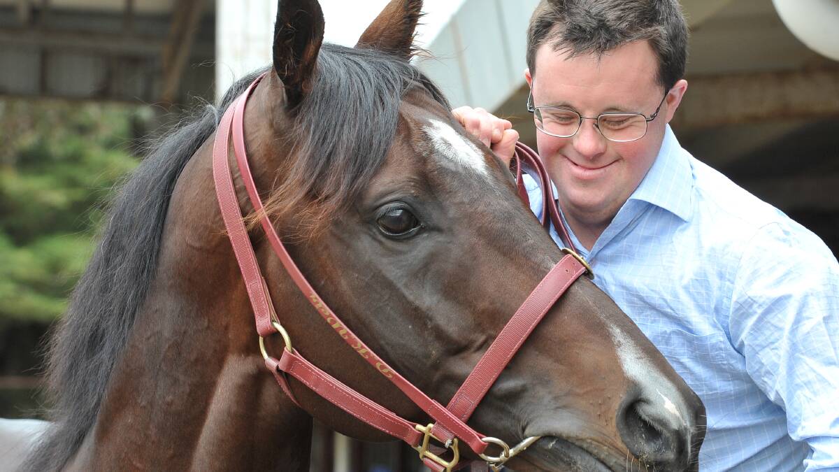 NORMAL BLOKE: The mother of a child with Down's Syndrome says Melbourne Cup strapper Stevie Payne shouldn't need to be a "joyous beacon" at all but just a regular guy doing a regular job.
