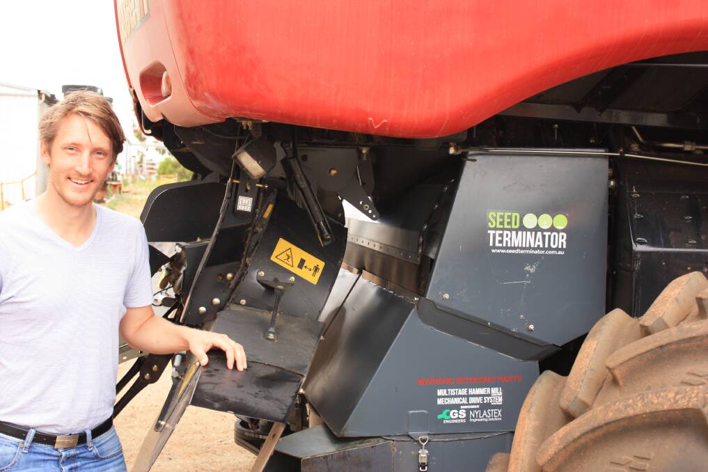 AIM:Dr Nick Berry with the Seed Terminator. The machine shapes up as a key weapon in the war against harvested weed seed using mechanically driven hammer mill technology.