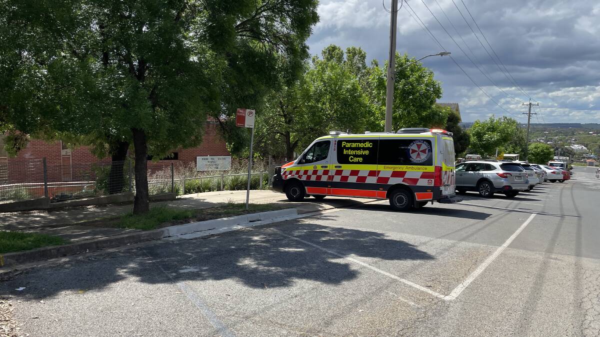Ambulance crews and police were also posted on the MacLeay Street side of Wagga High School. Picture by Conor Burke 
