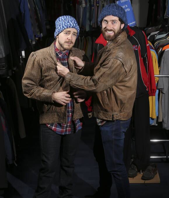 STYLISH: Star FM breakfast host Tom Bainbridge is styled by his co-host Olly Morris, an enthusiast op-shopper who is encouraging people to donate clothes or find bargains during National Op Shop Week. Picture: ELENOR TEDENBORG