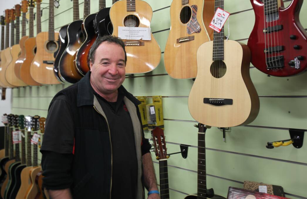 BATTLER: Peter Gleeson, who owns and manages Megas Music Store on High Street in Wodonga, admits it's been a quiet patch for his business in the past eight months.