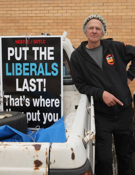 FED UP: Unionist Chip Eling thinks it's unreasonable he was fined for this poster on his ute, when other campaigns similarly use cars for advertising. Picture: DERRICK KRUSCHE