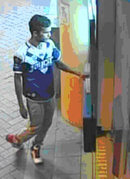 FAIL: CCTV footage of the man before smashing the Wodonga ATM.