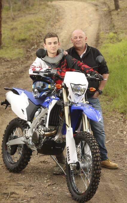 HOPE: Jacque Martin with his father Craig. Jacque says he was inspired by watching Australian Toby Price winning the Dakar this year. Picture: ELENOR TEDENBORG