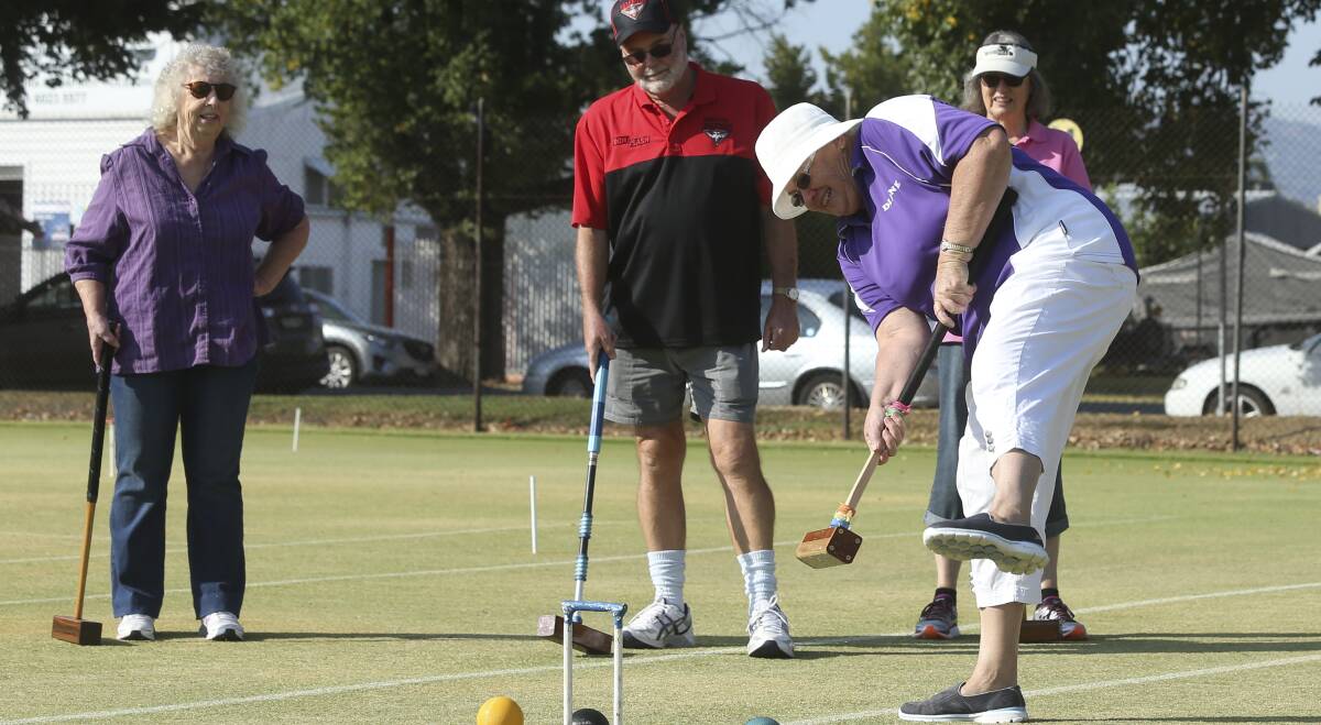 LIFE, BE IN IT: Sandra Lalor, Bill and Jenny Prideaux and Diane Wheatley play croquet in April at Twin Cities Croquet Club. Picture: ELENOR TEDENBORG