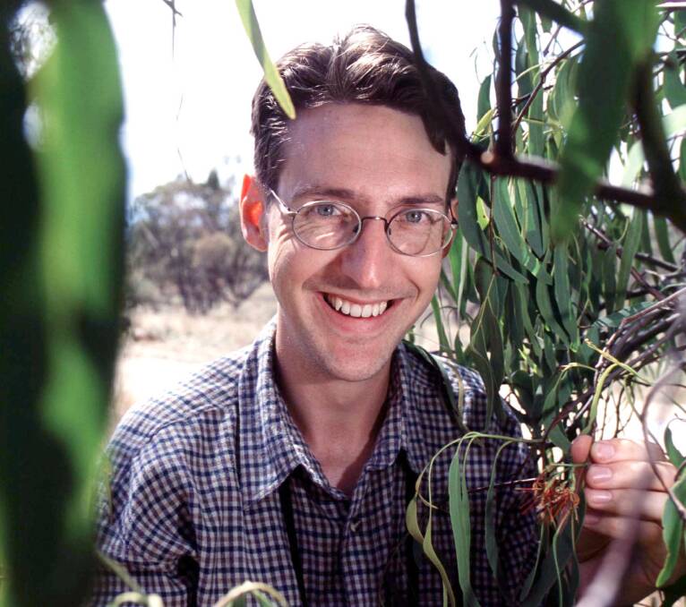 WHIZZ: Professor Watson out in the field with a native mistletoe species while researching the plant back in 2004.