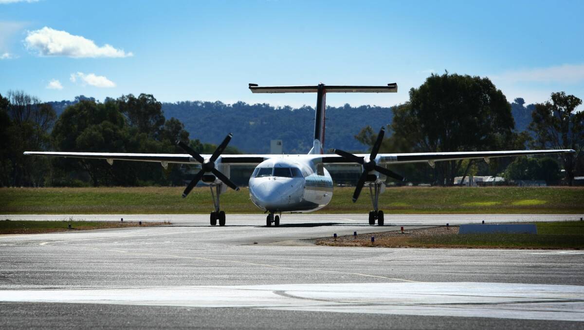 TOUCHDOWN: A QantasLink aeroplane arrives at Albury airport in 2011.
