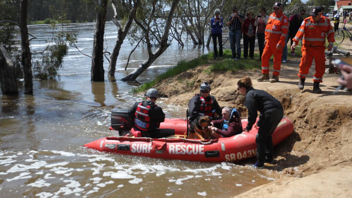 Man rescued from floodwaters after ignoring SES warning