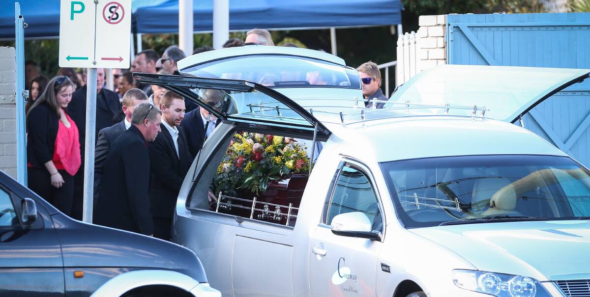 VALE: The late Adrian Heber is farewelled by more than 200 people at the Chapel of Conway Funeral Home in Wodonga on Friday. He was remembered as a committed employee with a strong work ethic, Picture: JAMES WILTSHIRE 