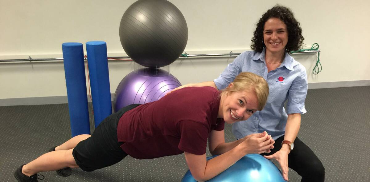 STRETCHY:  Physio student Sabrina Fargey and clinical educator Melissa Haberfield preparing for the classes which commence on Monday.
