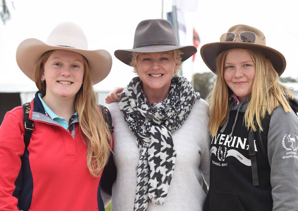 AKUBRAS: Georgia Shaw, 14, her mum Kath Shaw, and Maddie Logan, 13, from Springvale near Wagga celebrate the 40th anniversary at the Cookardinia Road site.