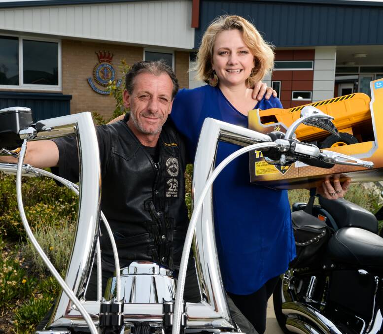 READY TO GO: Party Unlimited Motorcycle Club's Jock Allen and Kristen Moroney hope more riders will join up in time for Saturday's toy run to help the Salvation Army and the Border's needy this Christmas. Picture: MARK JESSER