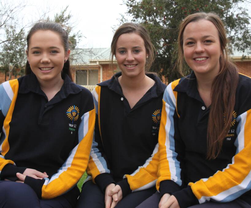THE THREE AMIGOS: Catholic College Wodonga year 12 students Breanna Ballard, Hannah McKerral and Holly Lehmann are pondering where to go for tertiary study next year after their final VCE exams.
