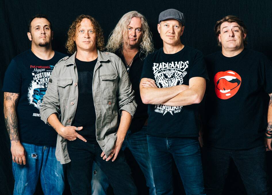 NOVOCASTRIANS: Screaming Jets guitarist Jimi Hocking, second from left, enjoyed a stripped-back recording process for their latest album.