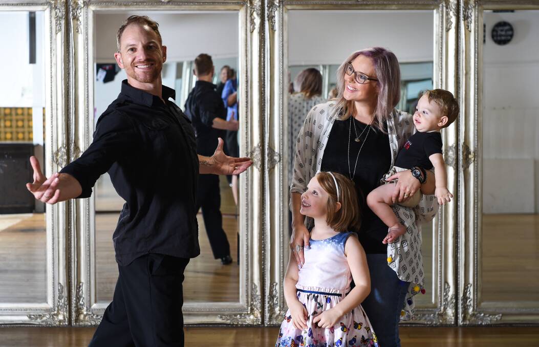 LEADING MAN: Albury-Wodonga Dance Centre owner Glen Strauss will head overseas to compete in the Blackpool Dance Festival, supported by his wife Niki and children Mabelle, 6, and Arty, 1. Picture: MARK JESSER