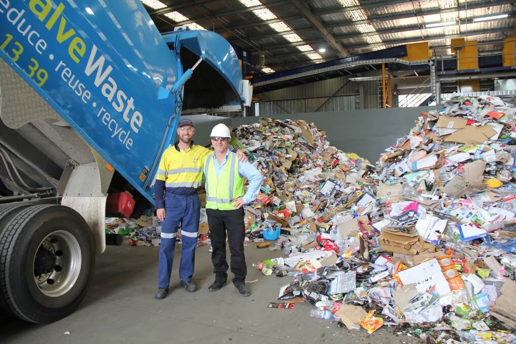 CLEAN TEAM: Driver Glen Smith with Cleanaway branch manager David Collins at the new Albury Materials Recovery Facility in Lavington, which has the capacity to process up to 2700 tonnes of material a month. Picture: Supplied