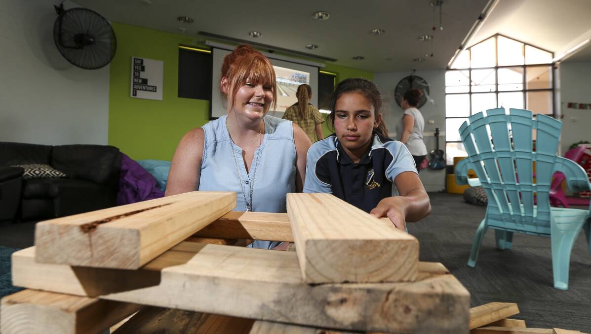 VIBRANT SPACE: YES youth services program manager Tam Quinn with Tijonay Newman, 12, at Lavington's new-look youth centre, The Hive, which will be officially opened on Friday. Picture: JAMES WILTSHIRE