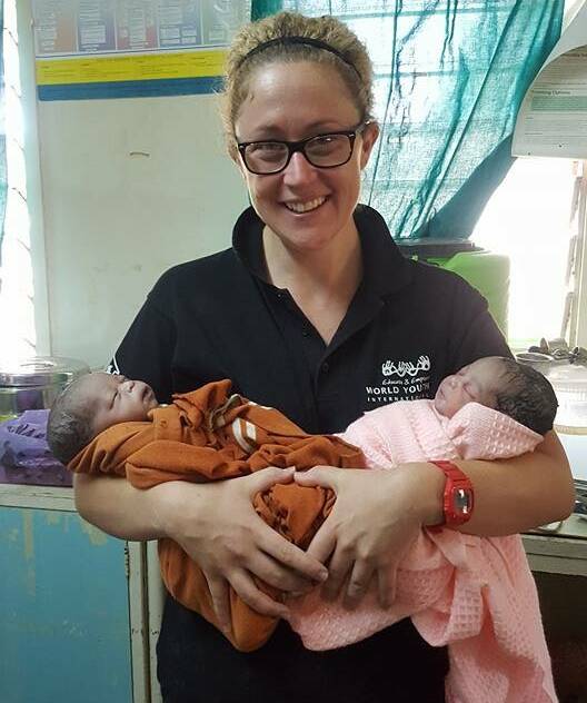EYE-OPENER: Sarah Dechert helped deliver these gorgeous twins - a boy and a girl - during her time as a volunteer nurse in Kenya.